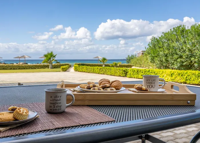 Sandoa - Beachfront Apartment *